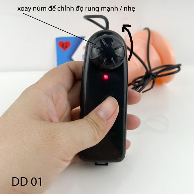 cu giả rỗng ruột có dây đeo